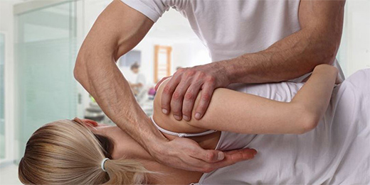 Woman getting an adjustment as part of her Chiropractic Care